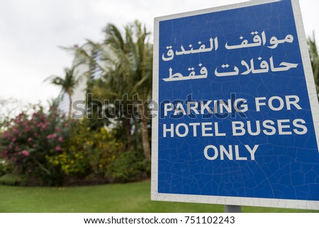 parking sign cracked about the hotel