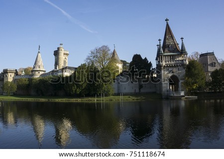 Laxenburg Castle near Vienna in Austria located at a lake. Picture was taken during Autumn