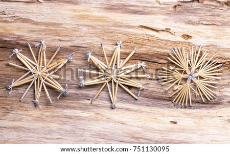 Christmas decoration hanging over the wooden background