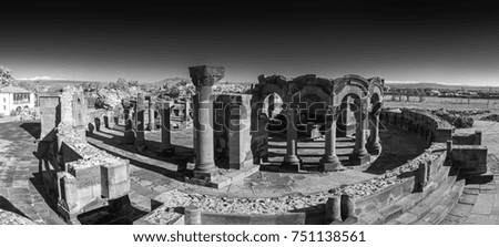 panorama of the unique stone ruins of the Zvartnots temple, 640th years. AD, with Aragats Mountain on background (on left), Armenia. Ancient architecture. Black and white photography