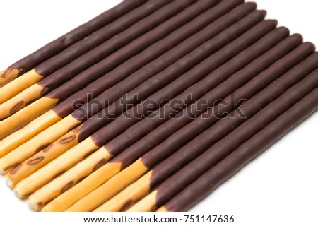 Chocolate Filled Biscuit Sticks on White Background