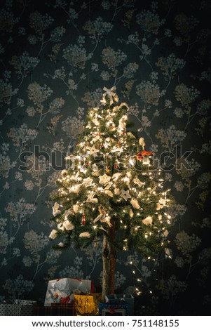 Ambient scene with Christmas tree on dark background