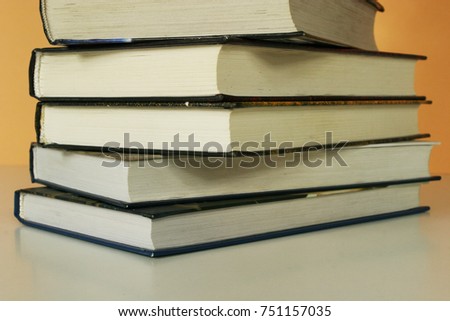 A stack of books on the table