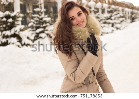 Young woman in winter park