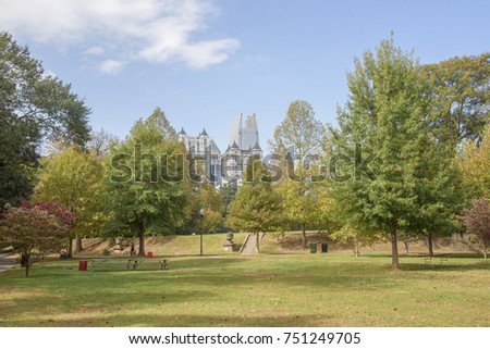 Beautiful Atlanta skyline towers from Piedmont Park