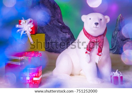 A polar bear with presents for the New Year holiday.