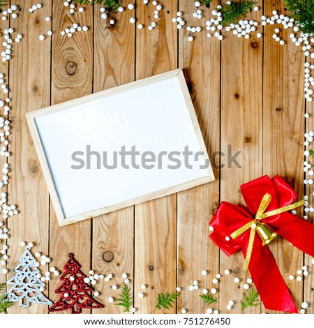 Christmas background with picture frame and ribbon