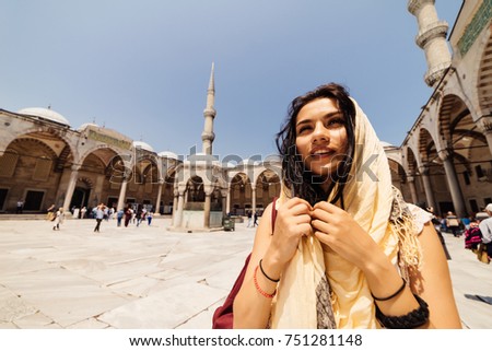 A young Muslim woman in a scarf goes to the mosque, Istanbul. Summer vacation, travel. Hispanic girl, Iranian, Syrian woman