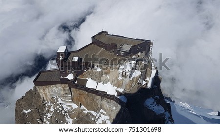The Aiguille du Midi summit station,an observation terrace among the white clouds,tourist can reach there by cable car. Chamonix-Mont-Blanc, France
