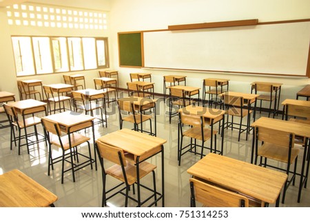 Lecture room or School empty classroom with desks and chair iron wood in high school thailand, interior of 
secondary education, vintage tone educational concept
