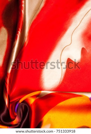 Fabric colors abstraction, with a pattern of yellow,  red . Photography Studio
