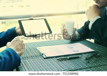 businessman working out of office near natural feeling for present business work and marketing plan with computer screen clipping path
