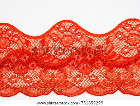 The texture of fabric lace, red