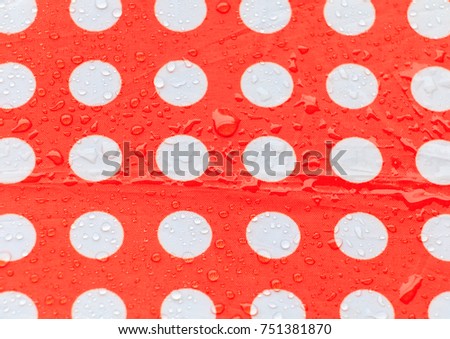 water drop on a waterproof fabric point Red and white beautiful background  with copy space