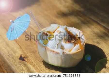 Coconut ice cream in a coconut shell, Thailand street food.