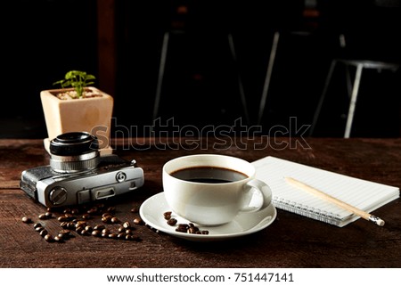coffee camera and smartphone on wooden table. travel   concept