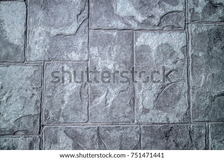 Textured stone brick background.