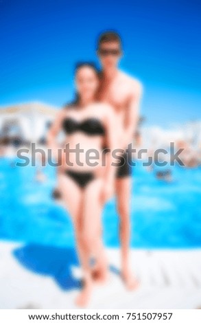 Blurred for background. beach resort. Men and woman relaxing in luxury beach resorts during summer holidays. boy and girl has rest on day lounge party at elite beach resorts of Ibiza.