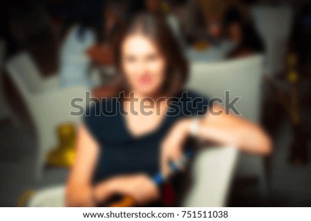 Blurred for background. People during concert in Ibiza night club party. Man and woman at club. Boy and girl at night club party. wedding party