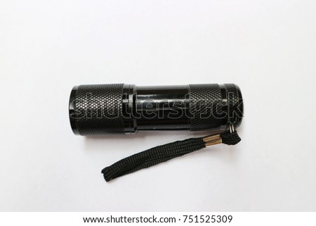 black small flashlight