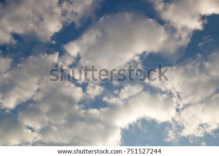 The blue sky with white clouds in clear summer day