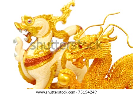 Golden and Lion statue - Asian style art - isolated on white background