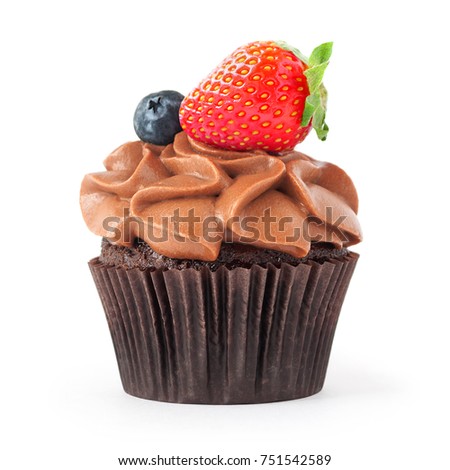 Chocolate cupcake with whipped chocolate cream, decorated fresh strawberry, blueberry isolated. Picture for a menu or a confectionery catalog.