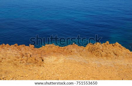 Landscape of the sea with rocks. Clear blue water in the bay.
