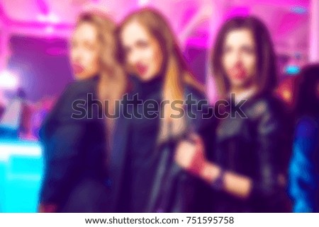Bluured for background. People during concert in night club party. Man and woman at club. Boy and girl at night club party