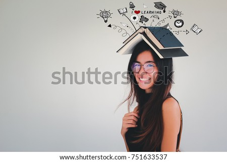 Young asian student woman holding book with learning doodles - I love learning concept