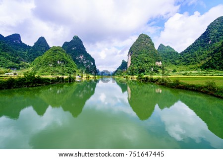Beautiful landscape, Quay Son river with rice field and mountain Trung Khanh town in Cao Bang province, Vietnam Royalty-Free Stock Photo #751647445