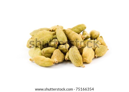 the spice Cardamom in a pile isolated on white