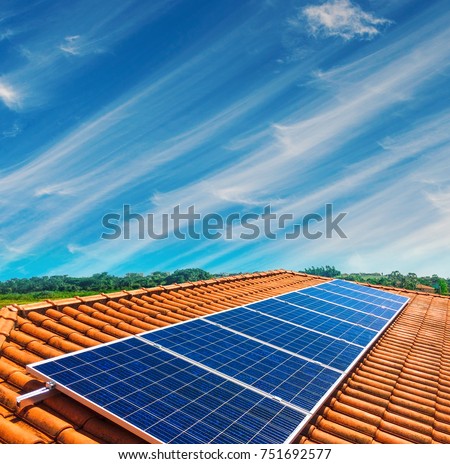 Solar Panel Photovoltaic installation on a Roof, alternative electricity source - Concept  Image of Sustainable Resources Royalty-Free Stock Photo #751692577