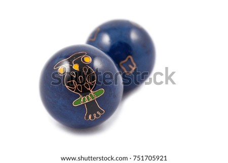 Chinese balls stock images. Chinese Health Balls on a white background. Metal meditation balls with owl