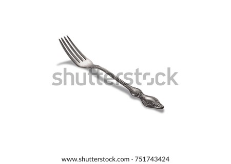 Retro silver fork isolated on white background