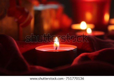 Candlelight with present on table prepare for Christmas 