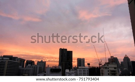sunset over buildings