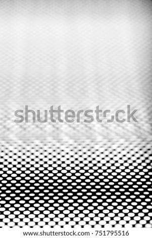 Metallic object structured dotted background