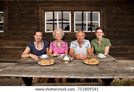senior couple and two daughters