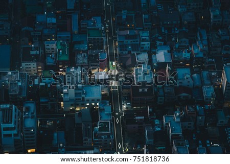 Tokyo city streets at night as seen from above aerial photography