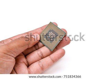 Processor in hand close up on white background 