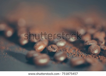 Coffee beans close up. Photo in instagram, vintage style with shallow depth of field.