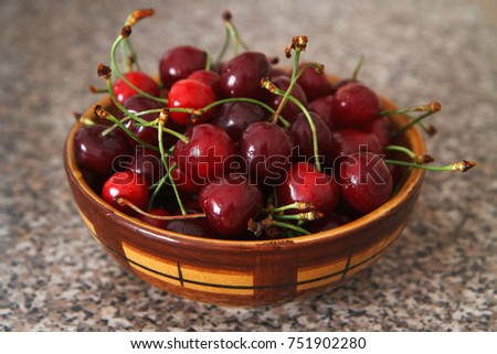 A plate of sweet cherry