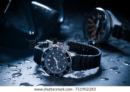 Diving watch with accessories. Royalty-Free Stock Photo #751902283