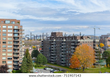 Modern condo buildings with huge windows in fall in Montreal, Canada.