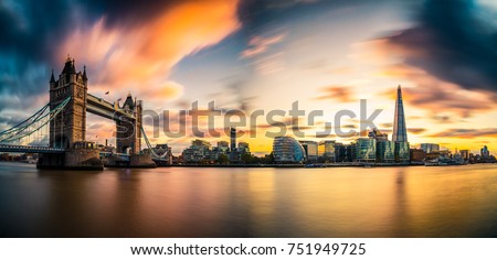 Sunset panorama with Tower Bridge and blurry sky 