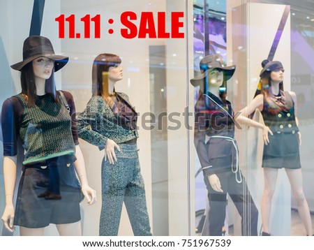 Window display with red sale words for 11.11 Chinese single day sale concept.