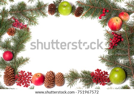 frame with apples and toys on white background with copy space. Christmas card concept