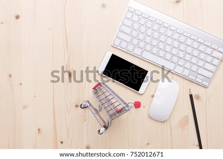 Top view  shopping online on office table 
