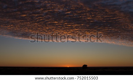 Sunrise and Cloud Formation. Birdsville Track, South Australia, Australia